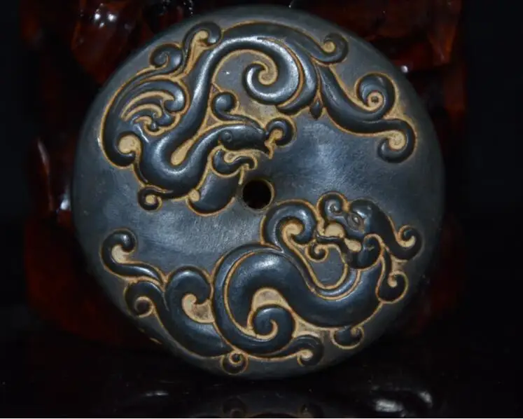 

Метеоритная скульптура Дракон Феникс