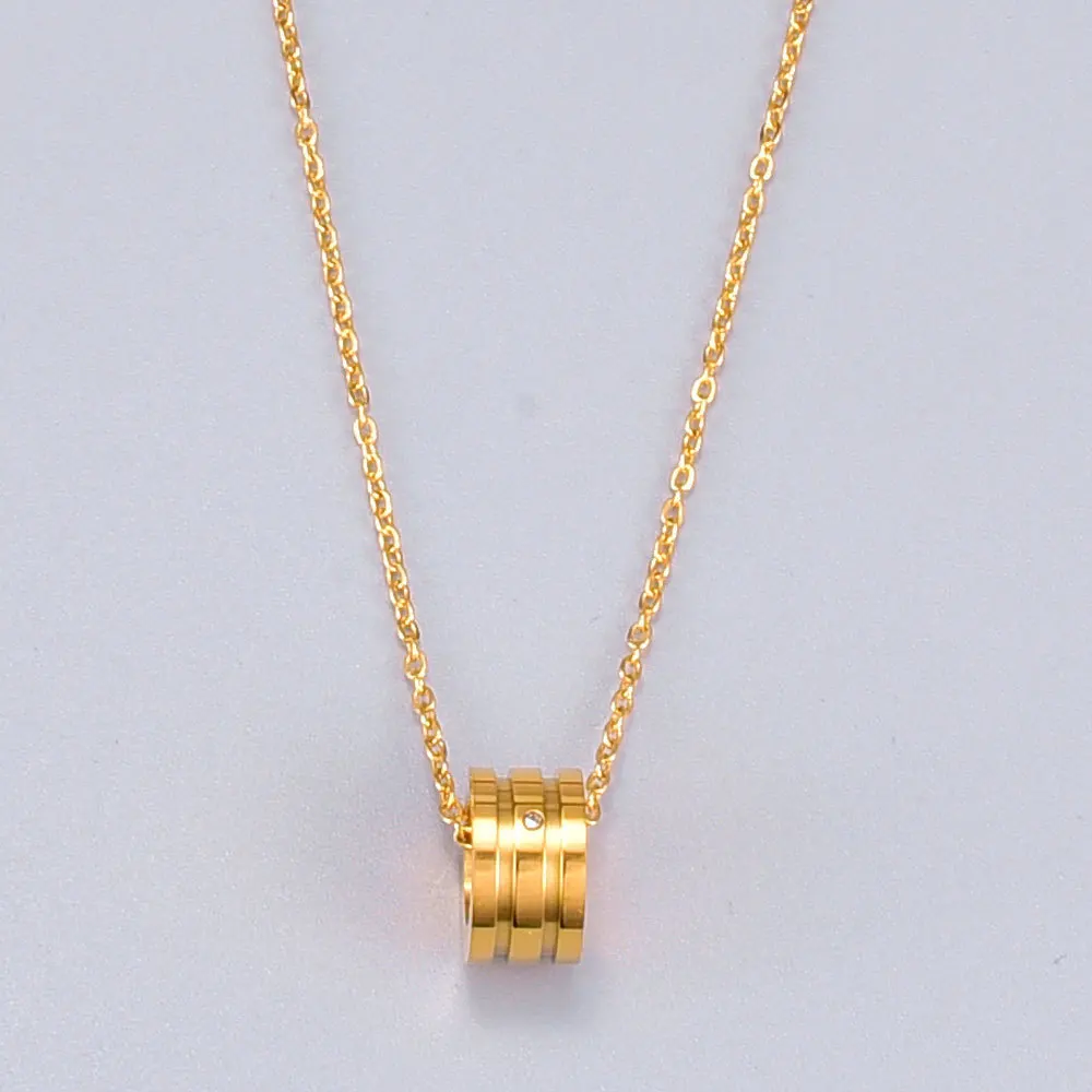 Чокер цилиндрический с двойным пазом маленький кулон золотистого цвета из