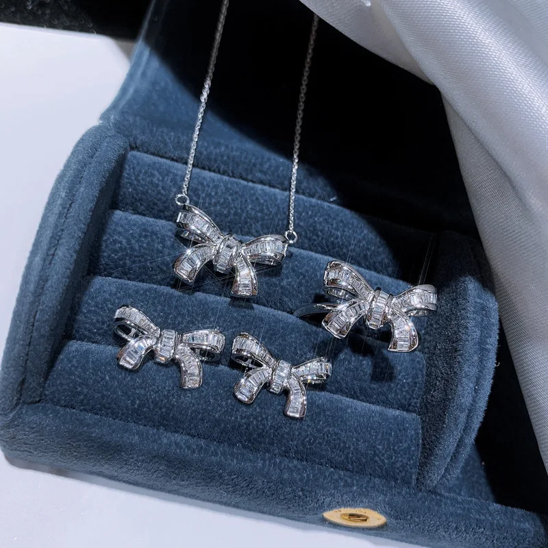 

New Design 925 Silver Color Jewelry Sets Women's Fashion White Crystal Zircon Exquisite Bowknot Pendants Necklace Earrings Rings