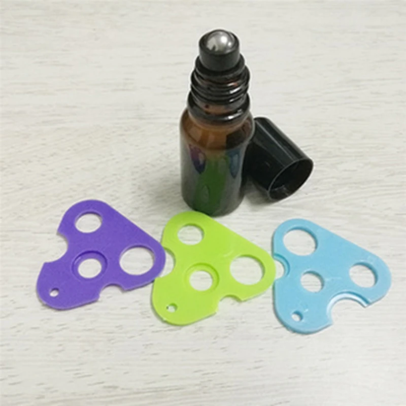 

Triangle Leaf Shape Refillable Essential Oil Opener Key Corkscrew Tool Remover Roller Balls Caps Refillable Bottles Accessories