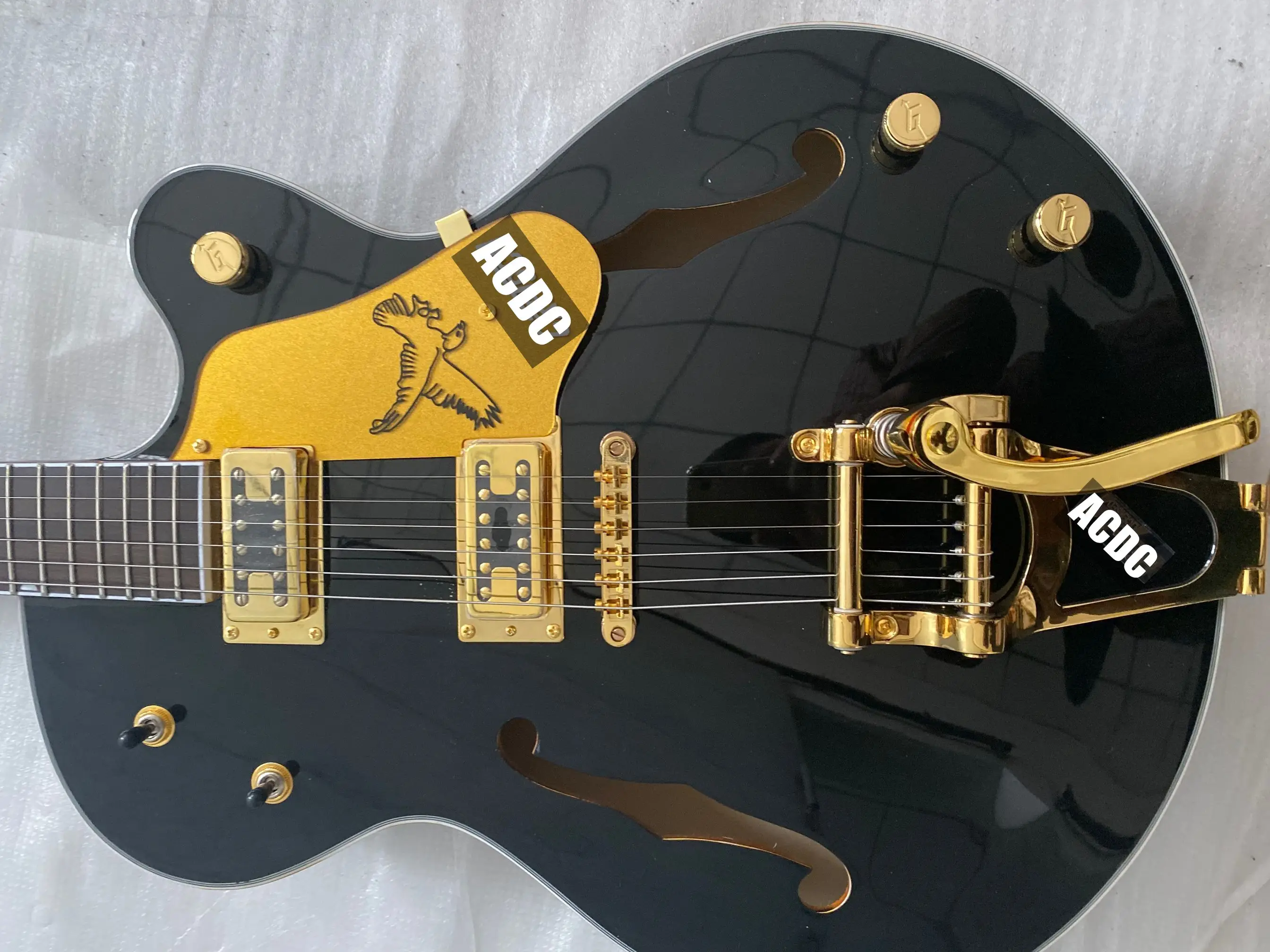 

Black Falcon G6120 Semi Hollow Body Jazz Electric Guitar Gold Sparkle Body Binding, Bigs Tremolo Bridge, Grover Imperial Tuners