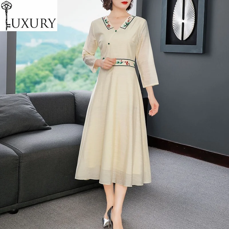 Качественное подиумное весеннее женское винтажное платье до середины икры с v