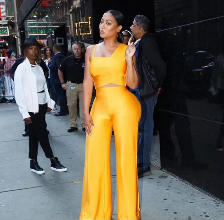 Женский комплект одежды из 2 предметов желтый облегающий короткий топ и брюки с