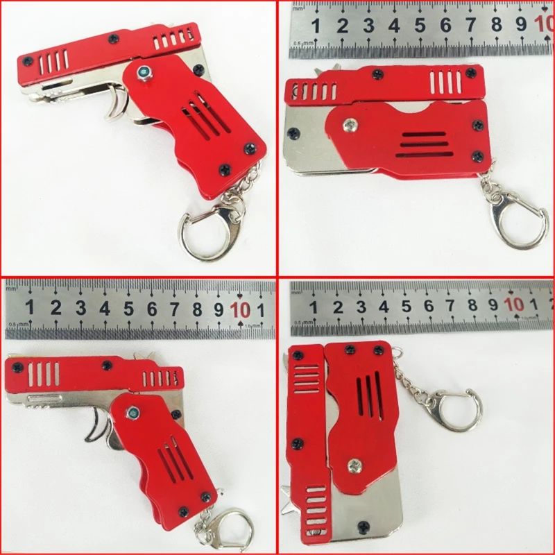 

Zinc Alloy Colorful Metal Mini Can Be Folded As a Key Ring Rubber Band Gun Kids Gift Toy Six Bursts Of Rubber Toy Gun