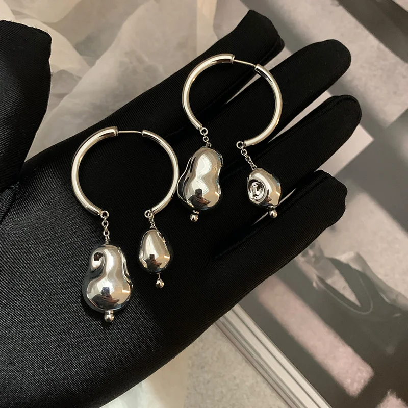 

Trendy minimalist hand-made glass blown silver double ball cold wind earrings