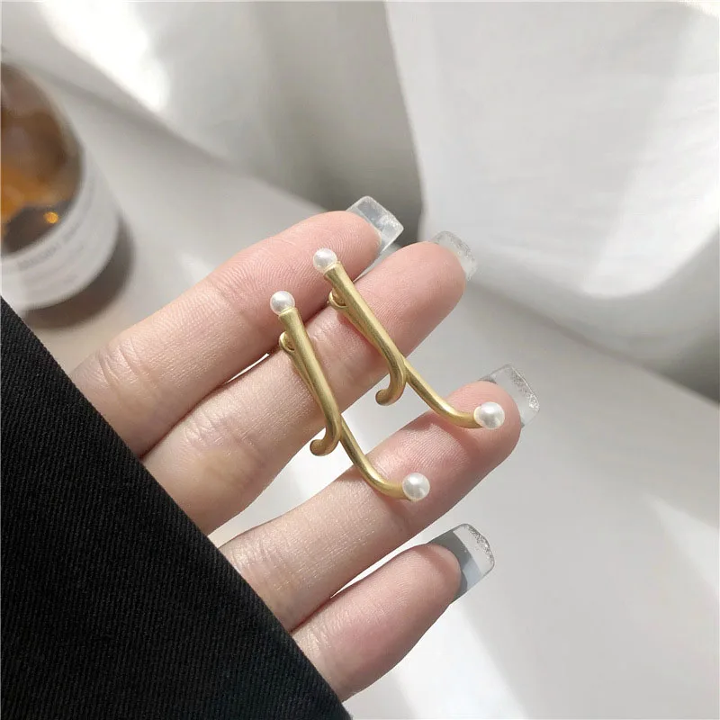 

Hip Hop Rock Geometric Pearl Earring Temperament Contracted Cross Earrings Before And After Wearing Women's Jewelry Gifts