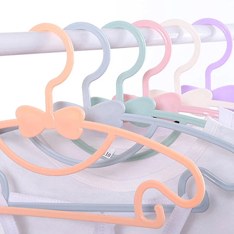 

5Pcs Kids Clothes Hanger Windproof Children Coats Hanger Bowknot Non-Slip Plastic Display Hangers Baby Pants Clothing Organizer