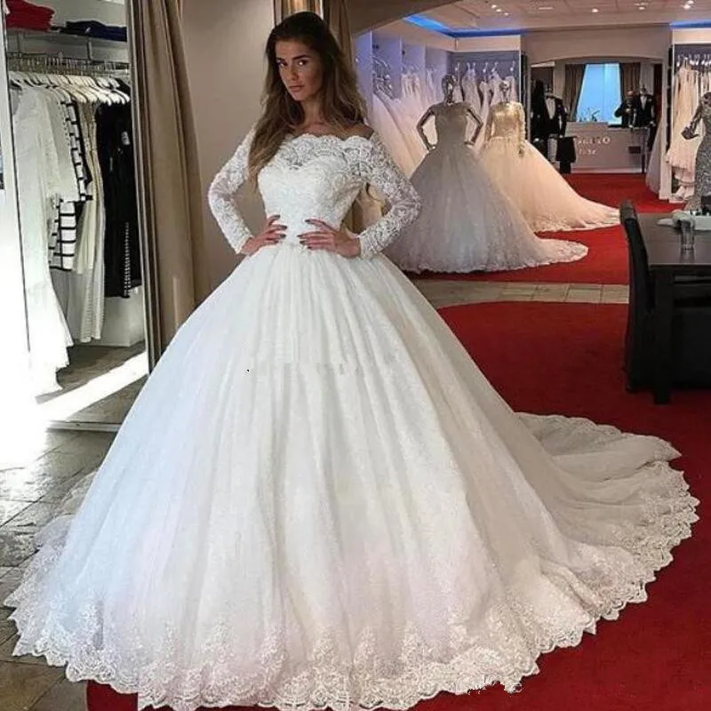 

2020 Ball Gown Wedding Dresses Lace Long Sleeves Boat Neck Lace Appliques Puffy Tulle Princess Bridal Gowns wedding gowns