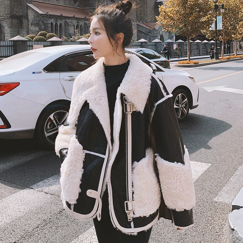 

Unua amo PU Leather Winter Coat Female Fashion Hit Color Spliced Design Locomotive Faux Fur Lambswool Leather Jacket Women