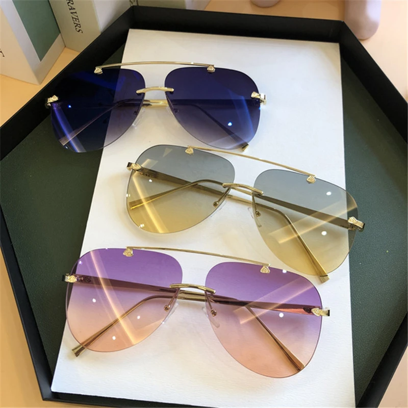 

Новые солнцезащитные очки без оправы с постепенной сменой, трендовые солнцезащитные очки с жабой, модные европейские и американские Солнце...