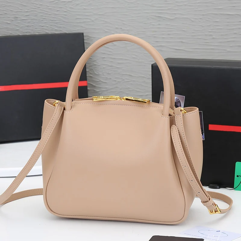 

Retro solid color triangle micro-label double handles leather large-capacity handbags ladies new fashion diagonal shoulder bags
