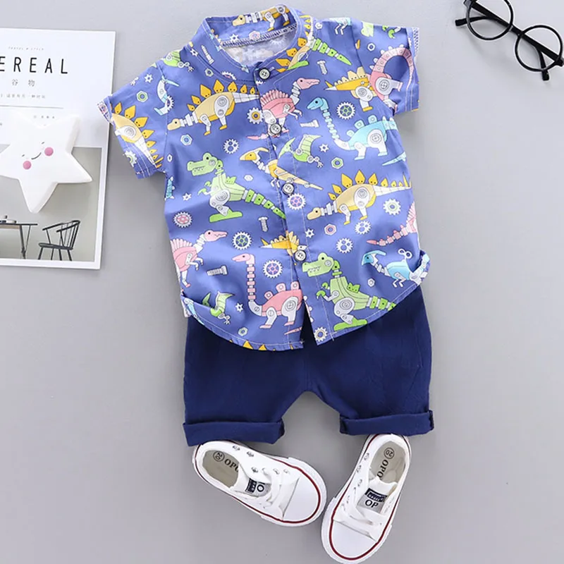

Новый костюм для мальчиков, летняя детская одежда, рубашка с милым мультяшным принтом динозавра, шорты с коротким рукавом, костюм