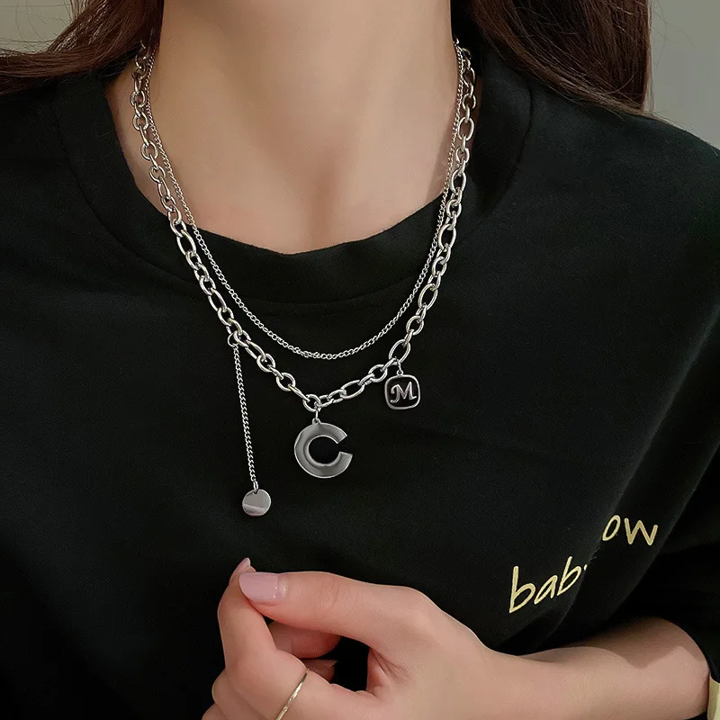 

European and American personality hip-hop double letter C round brand square brand titanium steel necklace men and women jewelry