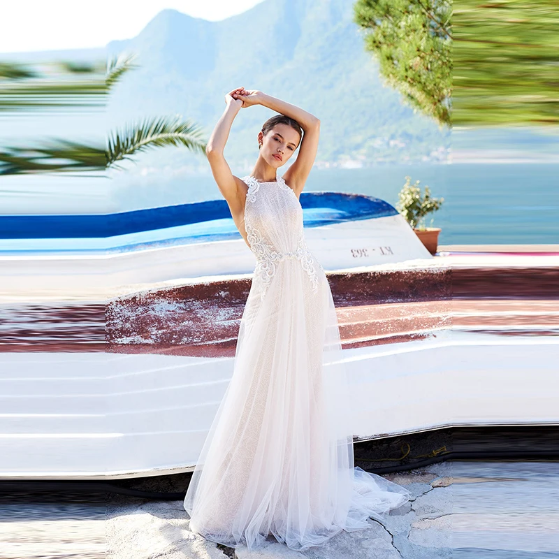 

New Arrival Charming Lace Sleeveless Bride Wedding Dresses O Neck Buttons Back Appliqued Beaded Bridal Gowns Sweep Train 2020