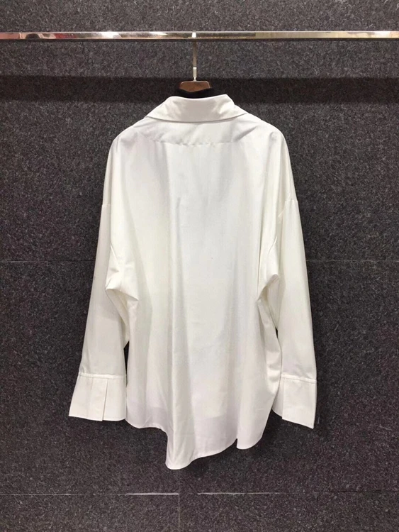 

2021 early spring new fashion women's high neck stitching decorative lapel fake two-piece shirt 104