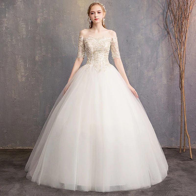 Свадебное платье цвета слоновой кости с коротким рукавом и вырезом лодочкой