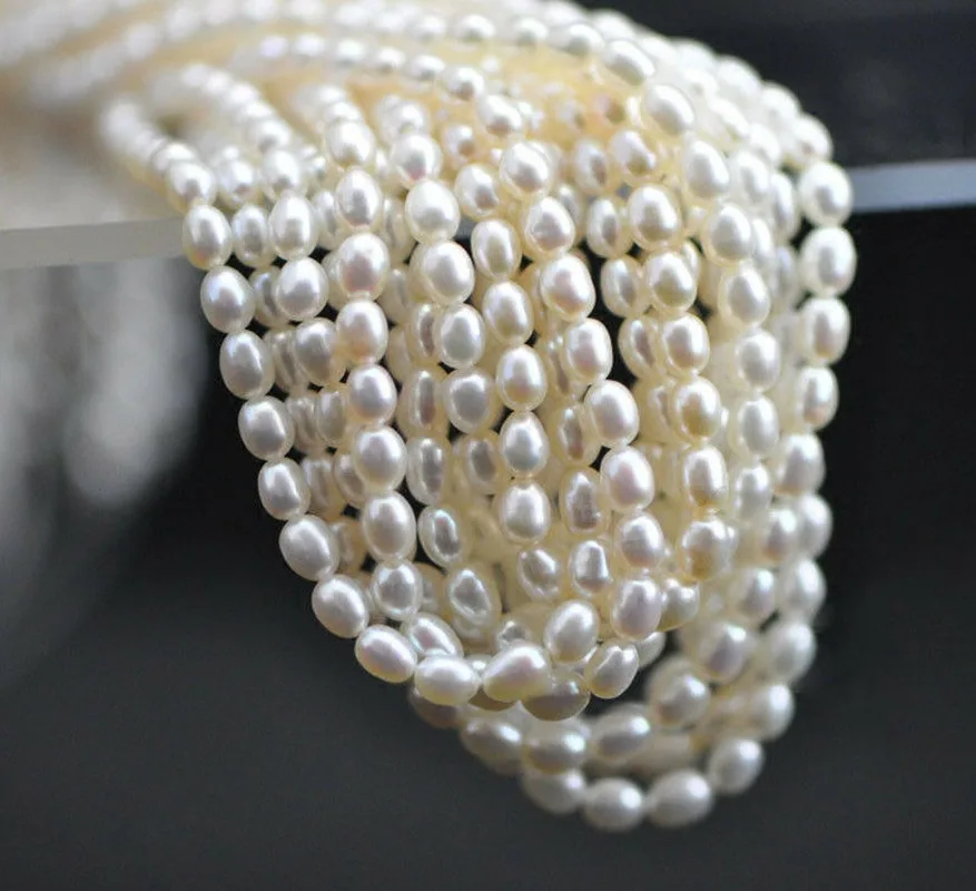 

New 4-5mm Genuine Natural White Rice Freshwater Pearl Loose Beads 13" Strand