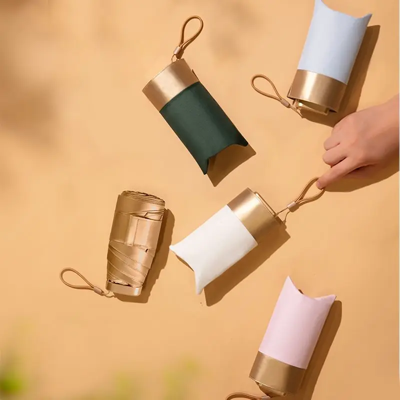 

Color Gold Coated Pocket Light Mini Flat Folding Umbrella Ultraviolet Umbrella UPF50 + Suitable Gift Female Child Umbrella