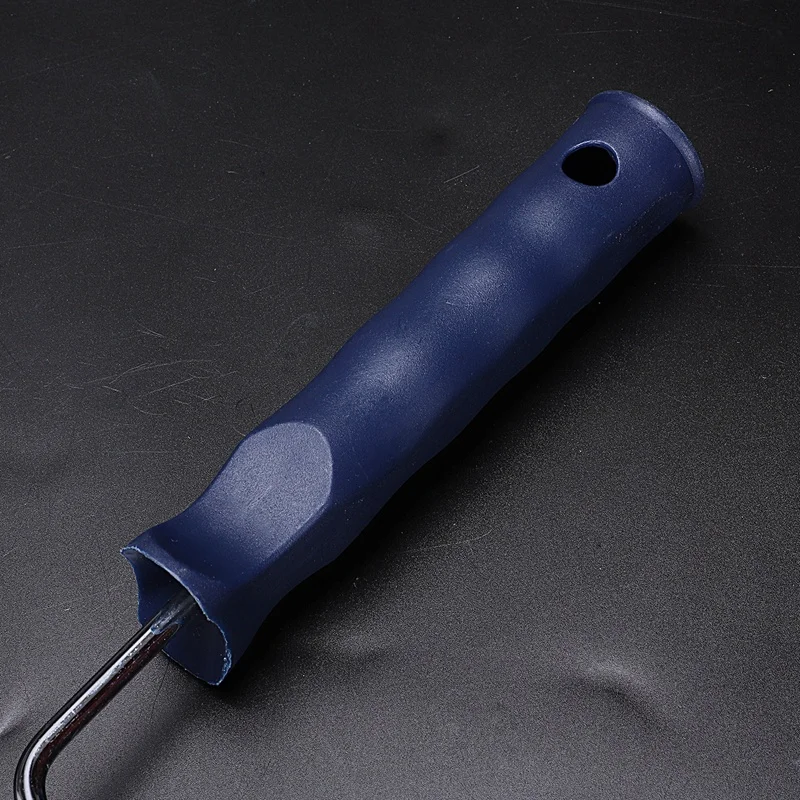 

7" plastic handle Spiked Roller
