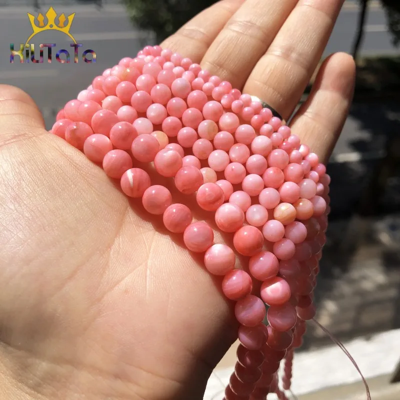 Розовые пресноводные ракушки россыпью бусины гладкие круглые камни для