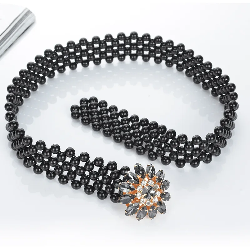 Женский пояс с цветочной пряжкой инкрустированный стразами черный эластичный