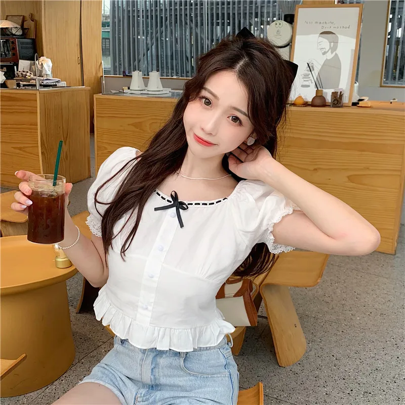 

Foreign style sexy white shirt women's summer design sense minority shirt shows thin waist, Korean personality slim