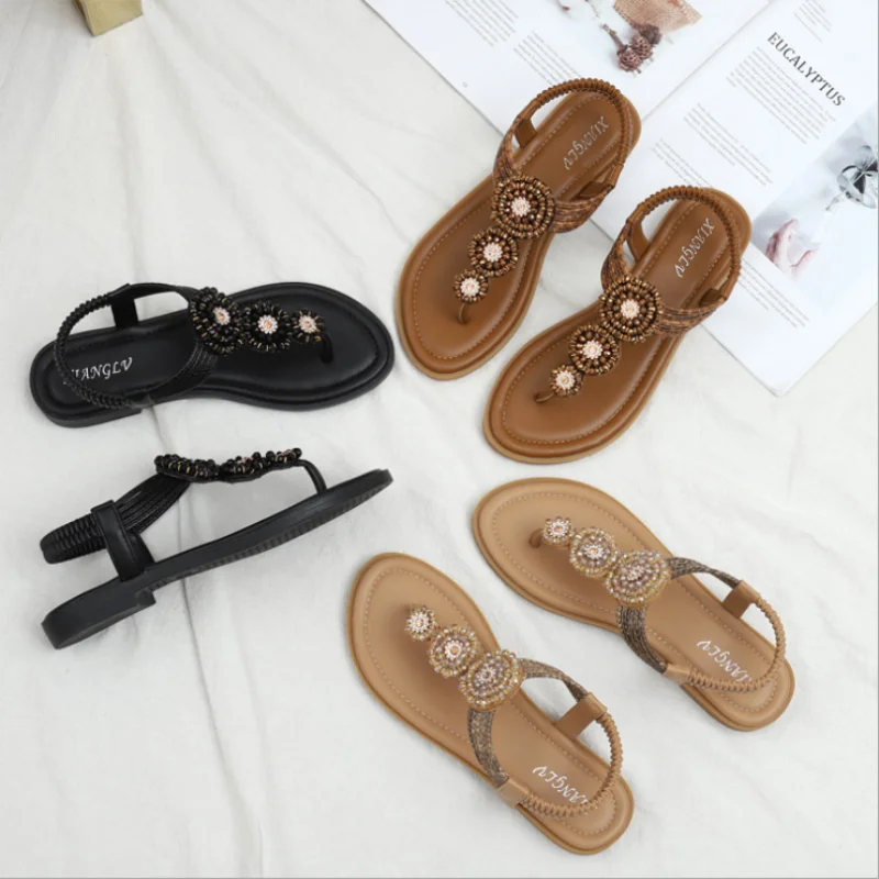 

2021 European and American Summer Sandals Female Bohemian Roman Flat Bottom Fairy Style Seaside Vacation Beach Shoes XM076