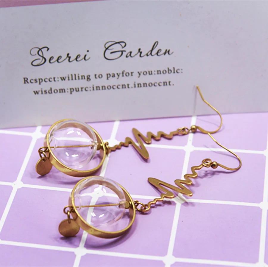 Женские серьги подвески со стеклянными шариками в виде геометрических колец