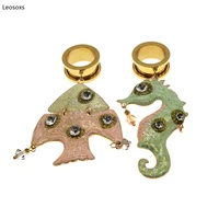 leosoxs 2pcs stainless steel ear gauges dangle plugs expander creative seahorse fish asymmetric earrings piercing jewelry