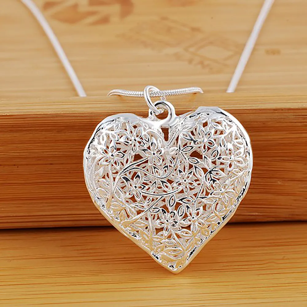

Fashion Jewelry Charm Silver Plated Pendant Heart Hollow Necklace Elegant Retro Woman Charm Statement Necklace Fashion Jewelry