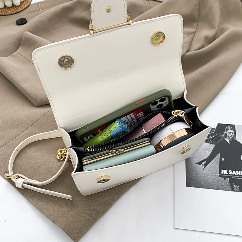 

Women's premium texture luxury shoulder bag 2021 new fashion designer pure color swallow metal ring wild messenger bag