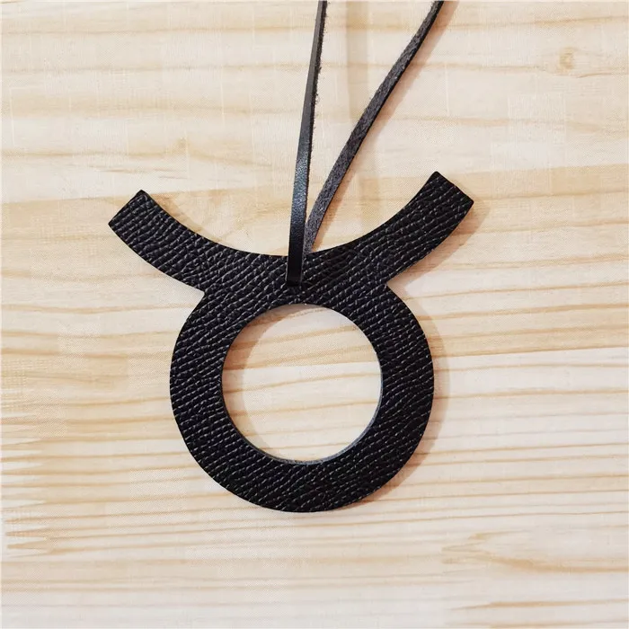 Брелок для ключей из натуральной кожи с изображением Зодиака | Украшения и