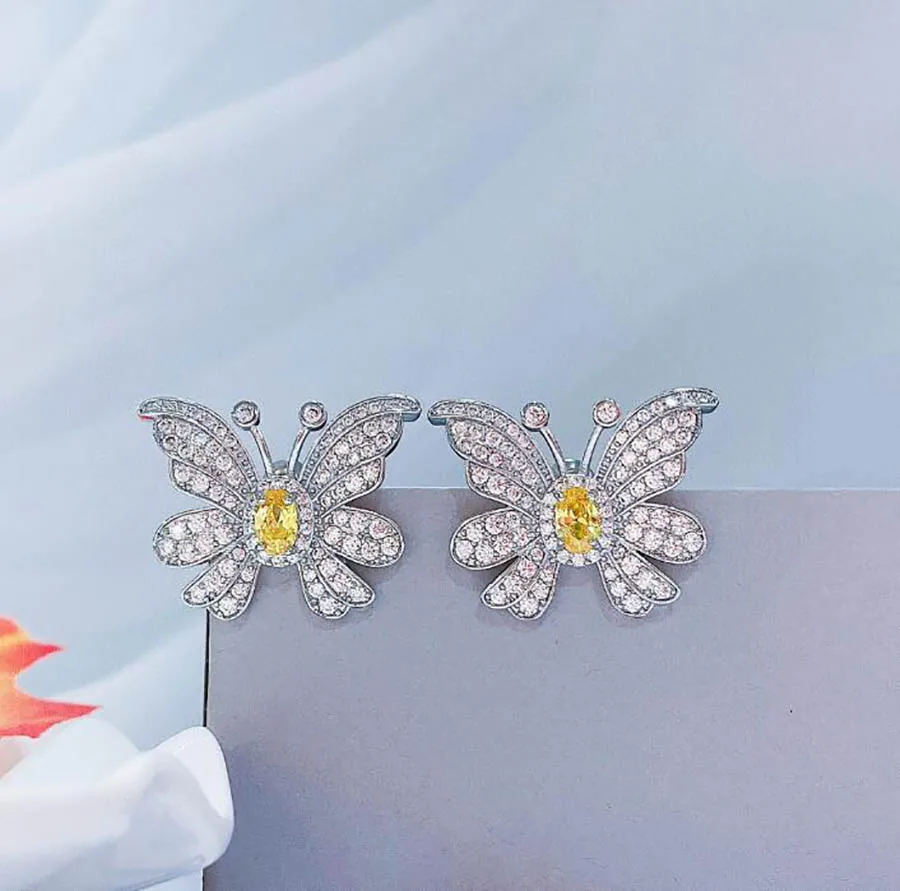 

New fashion smart butterfly gorgeous women earrings yellow gem sweet romance girls exquisite insect classic stud earring