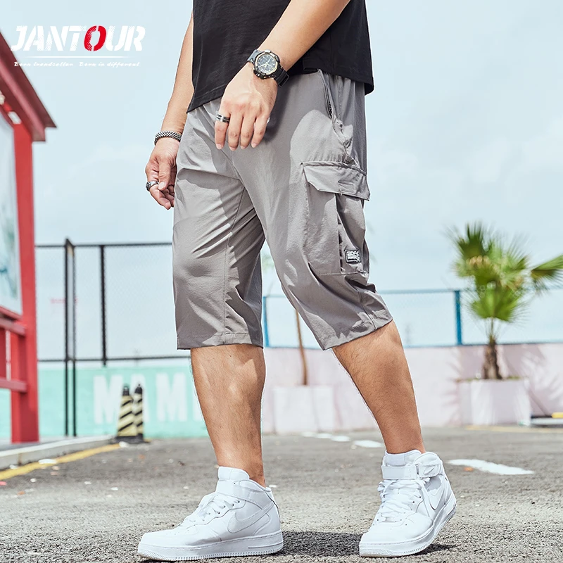

Jantour Brand Summer Thin Men's shorts Pants Loose Straight Beach Pure Pocket Knee-length Quick-drying pants Large Size L-8L