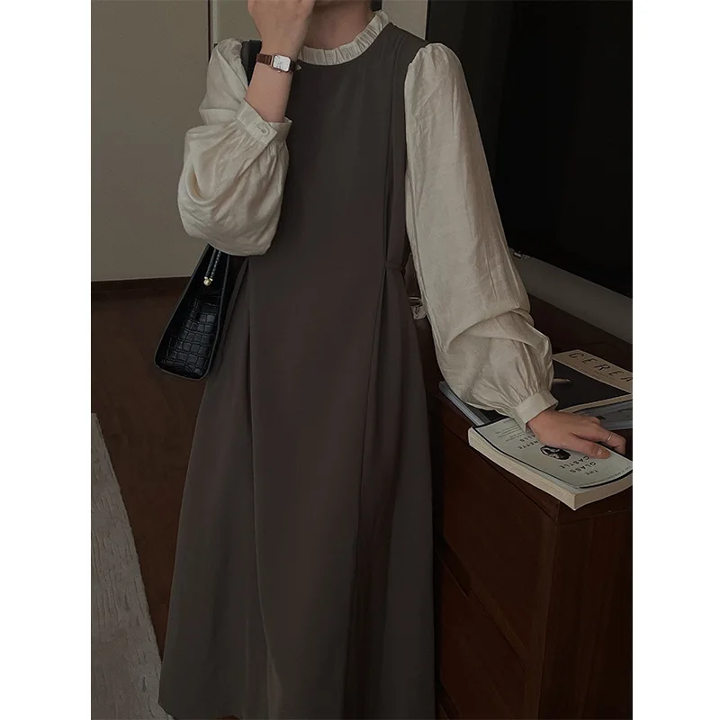 

Autumn 2021 new girls' splicing dress women's Korean round neck temperament solid color sweet A-line skirt fake two long skirts