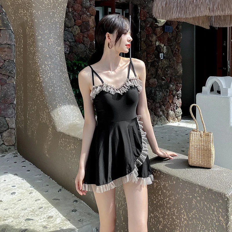 

Слитный женский купальник, из полиэстера, на косточках