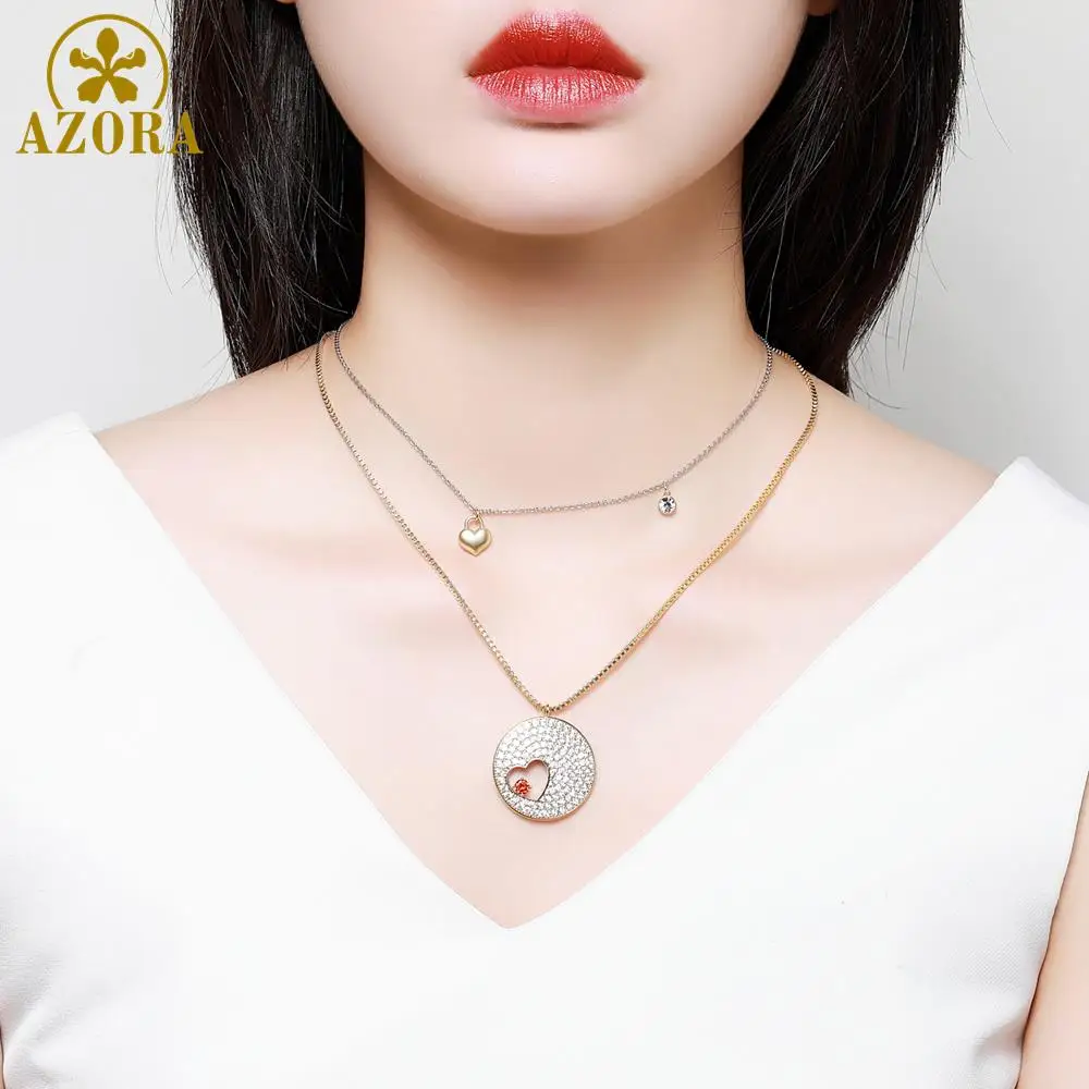 Женское Ожерелье с фианитом AZORA Золотистое двойным сердцем украшенное TN0287 |
