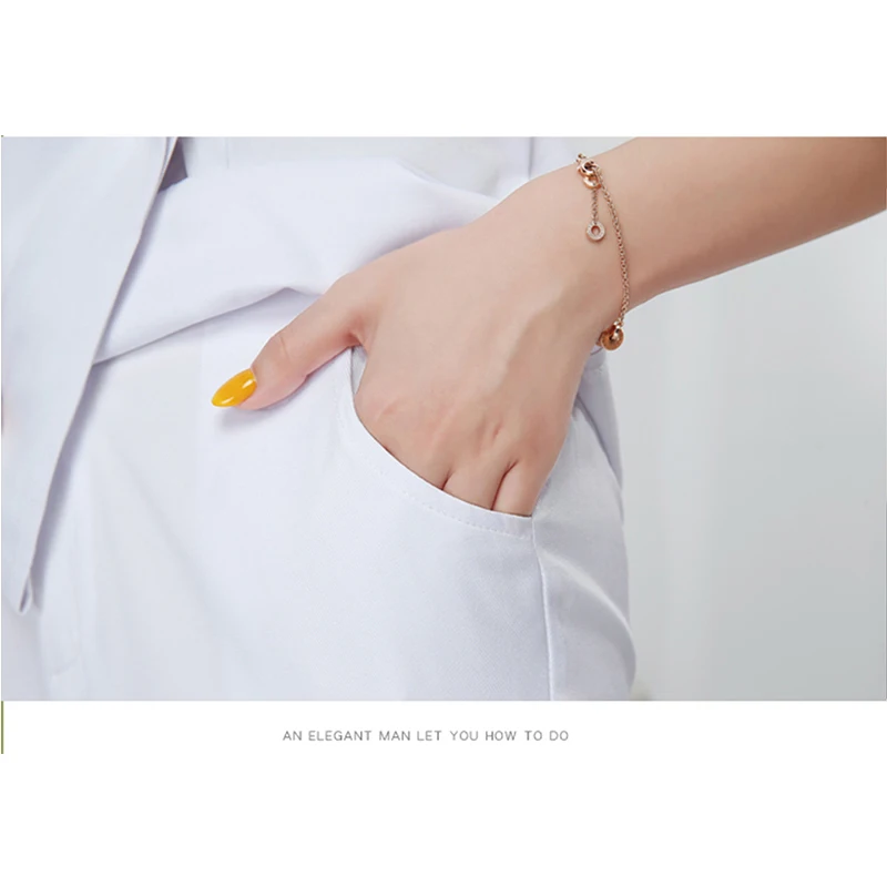 

2021 Women Beauty salon work clothing hotel waiter work clothes SPA Uniform autumn Seven-quarter sleeve sauna foot bath Uniforms