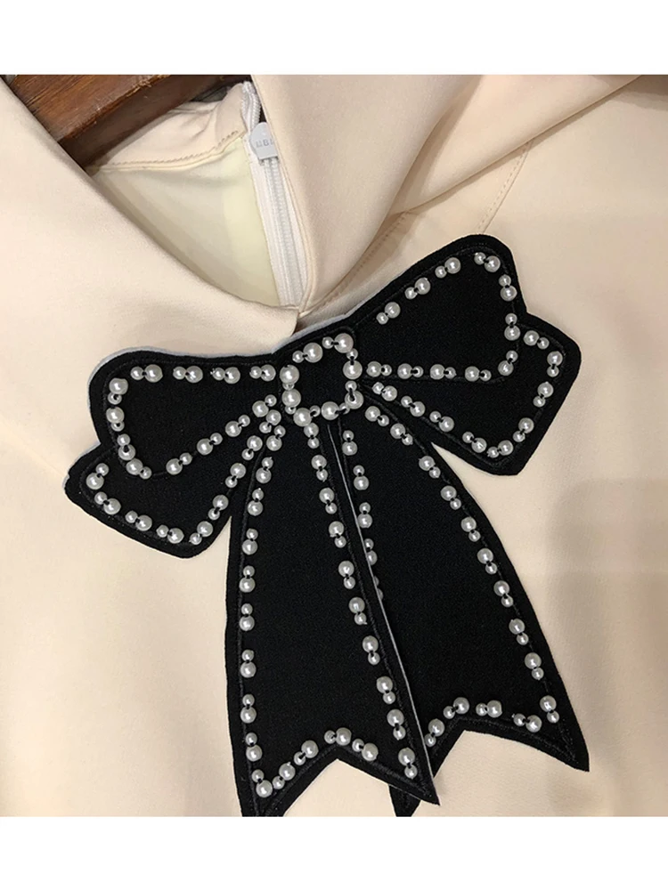 

Tight and heavy craft beaded bow tie contrast color women's summer bow dress2020New ladies summer fashion temperament dress Bing