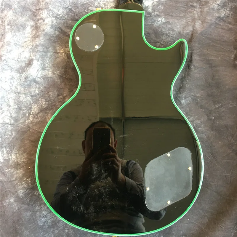 

High-quality left-handed electric guitar, solid mahogany body, green, maple flame top, gold hardware,