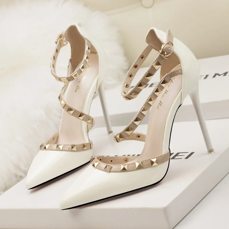European and American simple sexy nightclub stiletto high heels shallow mouth pointed rivet hollow word belt sandals