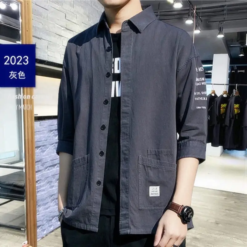 

Free Shipping 100% Cotton Three-quarter sleeve shirt men's casual shirt handsome workwear loose short sleeve jacket