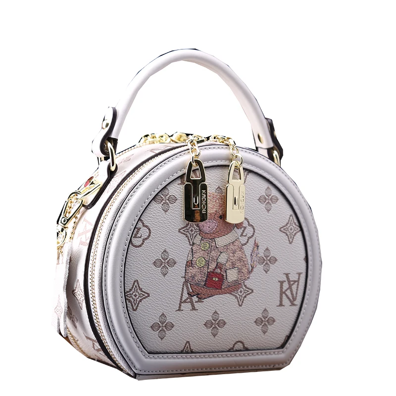 

Round Leather Bag 2021 New Female Fashion Chain Cartoon One-shoulder Messenger Bag Famous Luxury Designer Purses and Handbags