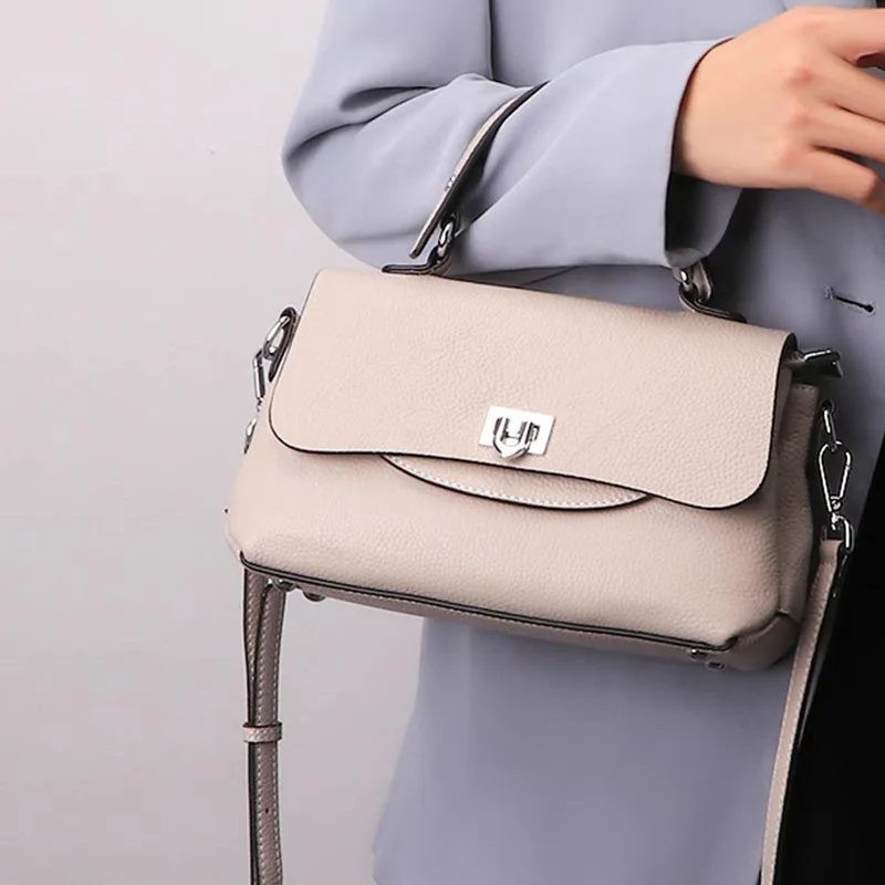 

2021 Cowhide Tote Live Large Capacity Single Shoulder Commuter Simple Clasp Diagonal Cross Burst Leather Bag For Women