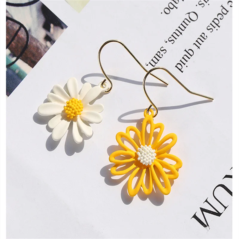 

small daisy earrings female hollow flower earrings sun flower earrings chrysanthemum petals Korean version