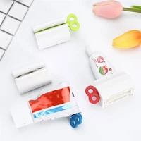 rolling tube toothpaste squeezer dispenser toothpaste seat holder bathroom accessories