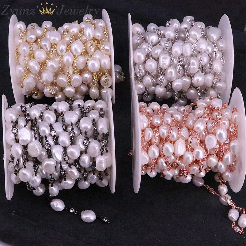 Цепочка с пресноводным жемчугом и белым цирконием разделенная бусинами из