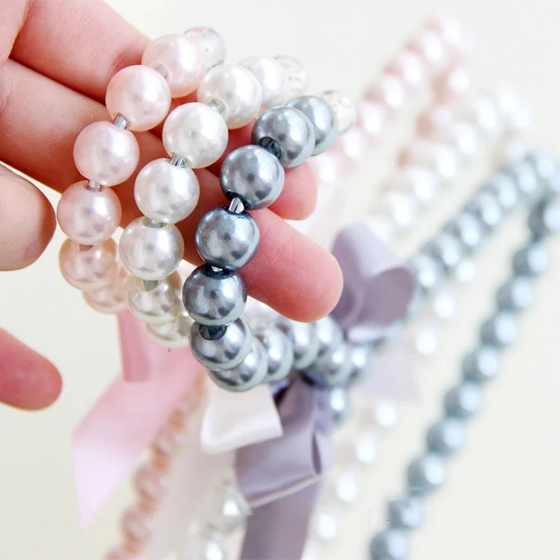 

15/20 Pcs Bowknot Children's Clothes Hanger Plastic Pearl Cat Dog Coat Hanger Fashion Clothes Pants Drying Rack Closet Storage