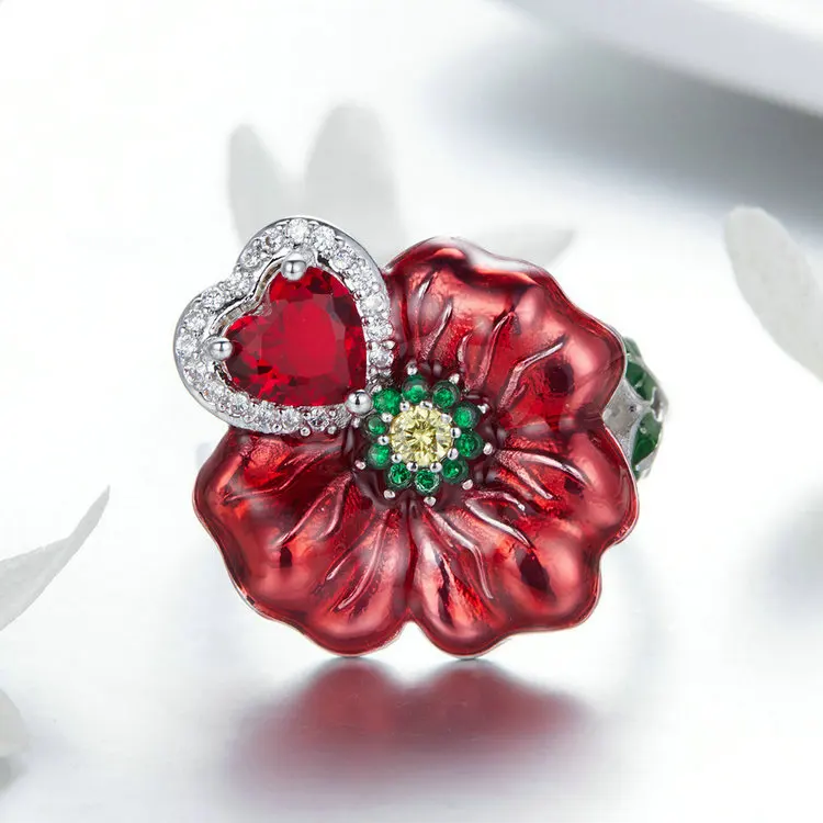 Качественное кольцо с розовым цирконием и красной огранкой принцессы