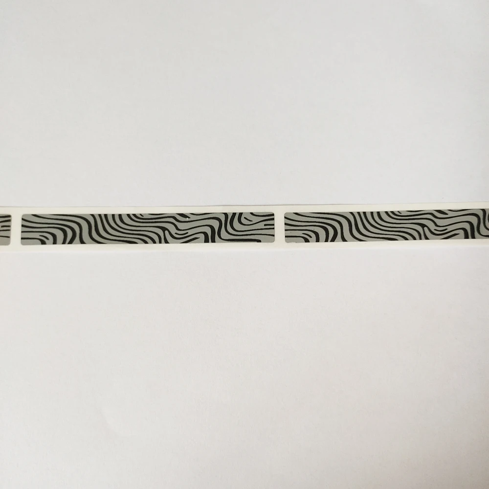 

Этикетка со скретч-наклейкой, 1000 шт., 9 х73 мм, лента с узором зебры в рулонах